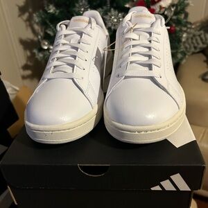 Women’s Adidas Advantage White Leather Sneakers with Cheetah print heel.